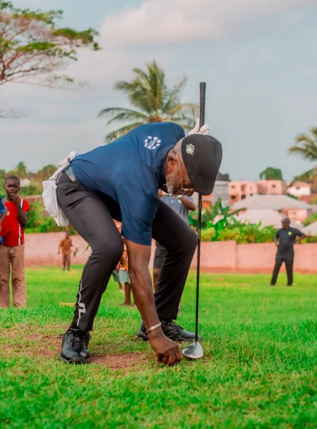 Golfer putting at the Obong of Calabar Golf Tourney